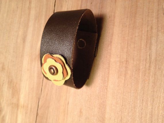 Sweet yellow brown and orange flower with copper rivet center on 1 inch soft brown leather cuff bracelet with snap closure. This cuff Etsy Shop Names, Brown And Orange, Leather Cuff Bracelet, Orange Flower, Leather Cuffs Bracelet, Soft Brown, Bracelet Cuff, Yellow Leather, Leather Cuffs