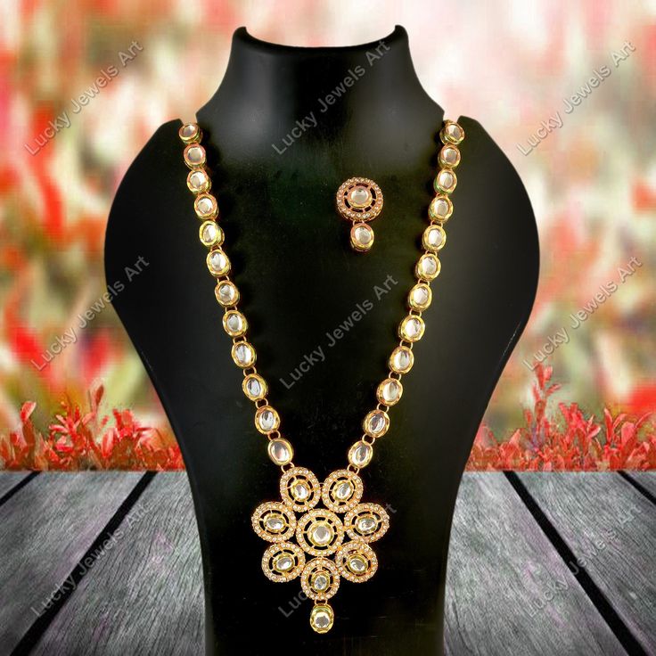 This is a stunning handmade necklace perfect for high end Jewelry Collector, a keeper in Traditional Vintage Indian/Pakistani Bridal jewelry and a Luxury Gift for your Daughter, Sister or Wife on Wedding or Anniversary. Perfect for any type of occasions, weddings And celebrations and a beautiful & memorable gift for weddings and special occasions. Description  -Item Code:- MO Meenakari Kundan Necklace Set w/ Earrings  Necklace Measures- 10" Long Adjustable with a Dori/Cord Earring Measures- 30x20mm approx Quantity- One Necklace Set Please see more different designs here:- https://www.etsy.com/in-en/shop/LUCKYJEWELSART?ref=seller-platform-mcnav I make every item of my collection with a lot of love and care, I pay attention to every detail.  You are more than welcome to contact me for any qu White Kundan Jewelry For Jewelry Making, Bollywood Pendant Jewelry For Wedding, Bollywood Style Pendant Jewelry For Wedding, Bollywood Style Wedding Pendant Jewelry, Wedding Festival Jewelry Sets With Pendant, White Bollywood Style Jewelry For Gift, Wedding And Festival Jewelry Sets With Pendant, White Bollywood Style Jewelry Gift, Bollywood Style Long Kundan Necklace Gift