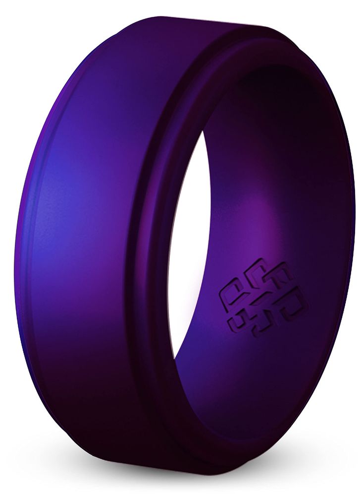 a purple ring with black lettering on it