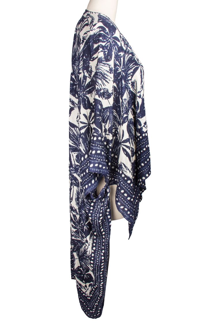 Whether you're going for a stroll under the sun or out for an evening, this ultra lightweight duster will radiate opulence. 26" L x 51" W Open front 3/4 length sleeves
 Side vents All-over print Woven 100% rayon Hand wash cold, line dry Imported Model stats: 5'10", 32" bust, 25" waist, 36" hip. Summer Beach Outerwear With 3/4 Sleeve, Long Sleeve Summer Kimono For Daywear, Summer Long Sleeve Kimono For Daywear, Spring Beach Outerwear With 3/4 Sleeves, Beach Outerwear For Spring With 3/4 Sleeves, Long Summer Outerwear With Floral Print, Bohemian Summer Outerwear With 3/4 Sleeves, Printed Long Sleeve Summer Outerwear, Bohemian Outerwear With 3/4 Sleeves For Summer