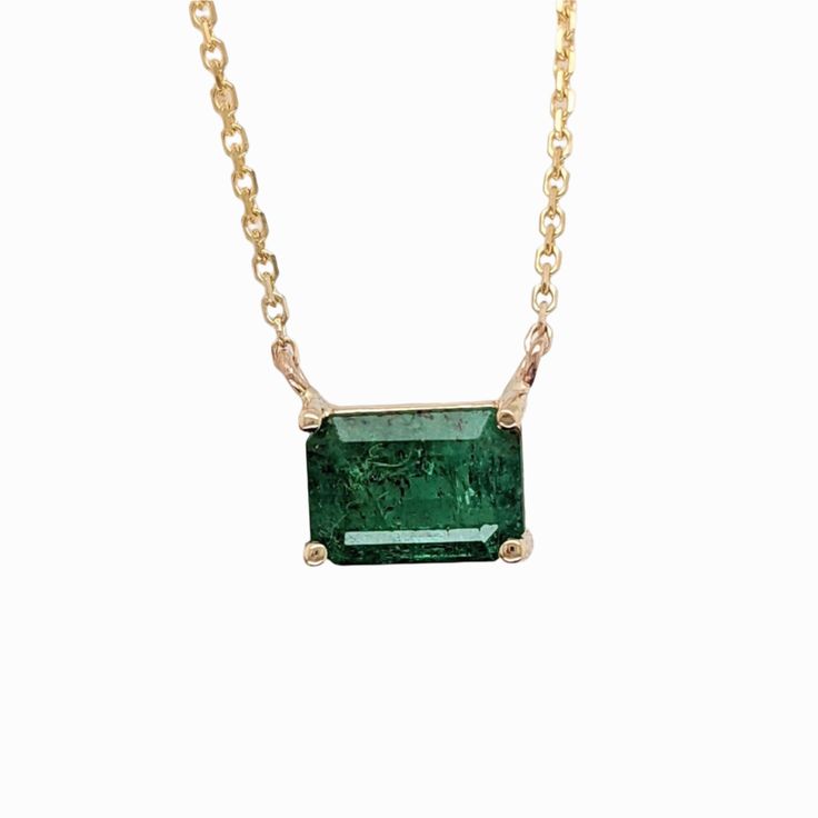 Elevate your everyday look with our Elegant Emerald Necklace in Solid 14K White, Yellow and Rose Gold. Featuring a striking Emerald Cut 7x5mm green gemstone, this minimalist piece is perfect for daily wear and work wear. Make a sophisticated statement with this chic and versatile necklace. Minimalist 14k Gold Emerald Necklace, Minimalist 14k Gold Emerald Gemstone Necklace, Designer Silver Jewellery, Jewelry Showcases, Emerald Necklace, Green Gemstones, Earring Findings, Pendant Bracelet, Emerald Cut