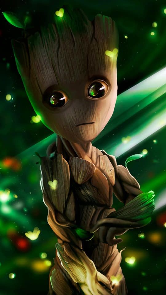 the baby grooter is standing in front of green lights and glowing stars, with his hands on his hips