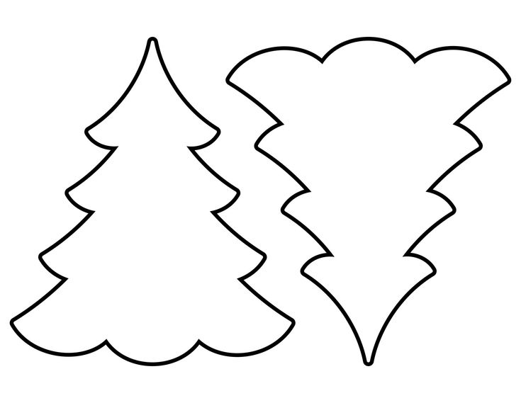 two christmas trees cut out from paper with the shape of a heart on each side