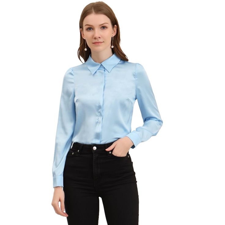 The long-sleeve fit of this shirt flatters most body types and provides enough coverage for a modest yet stylish look. The button-up front of this shirt makes it easy to wear and provides a timeless and classic look that never goes out of style. This shirt can be paired with dress pants or skirts for a formal workwear look, or dressed down with jeans or shorts for a more casual yet polished outfit. Blue Long Sleeve Semi-formal Tops, Blue Long Sleeve Top For Semi-formal Occasions, Long Sleeve Flannel Shirt With Button Closure, Slim Fit Button-up Blouse, Solid Long Sleeve Shirt For Office, Long Sleeve Tops With Back Button Closure, Blue Semi-formal Tops For Fall, Elegant Long Sleeve Blue Shirt, Elegant Blue Long Sleeve Shirt