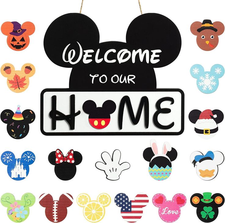 mickey mouse welcome to our home sign surrounded by cut outs and magnets on a white background