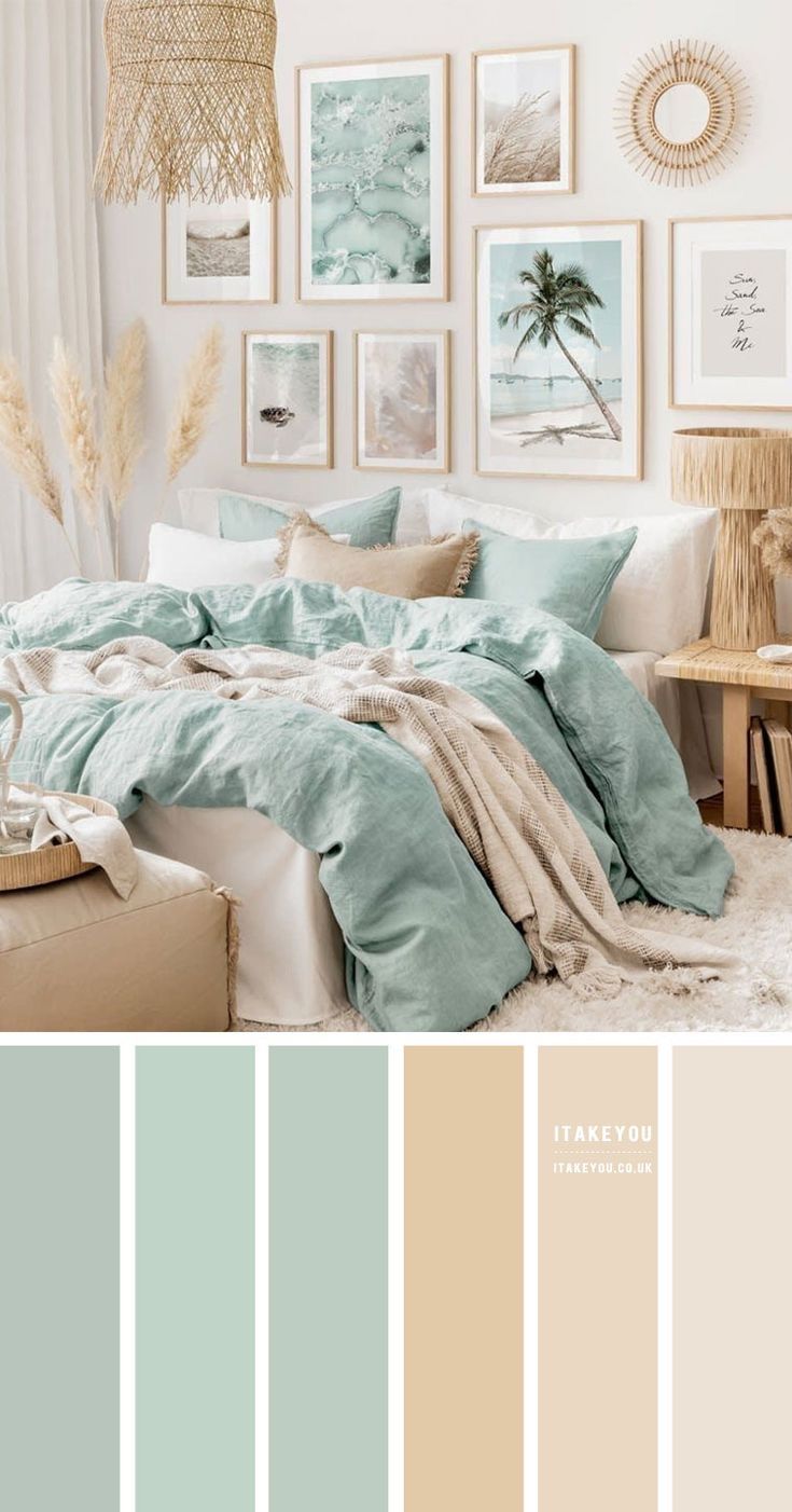 a bedroom with white walls, blue and beige colors on the wall and pictures above it