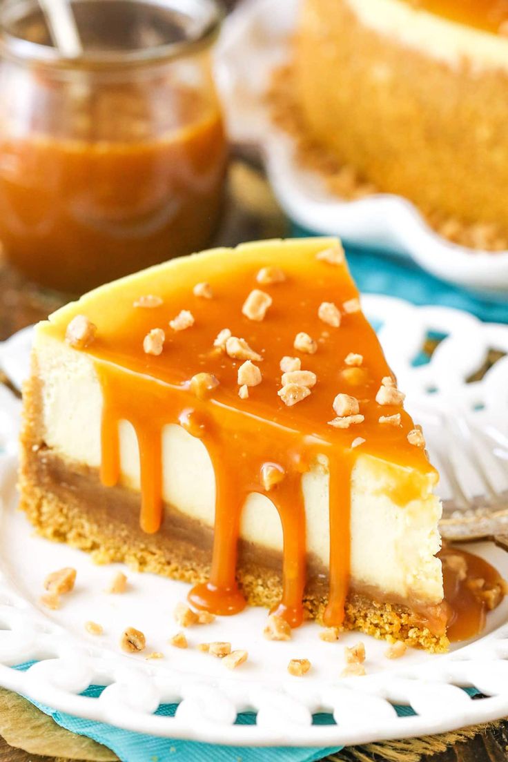 a slice of cheesecake with caramel sauce on top