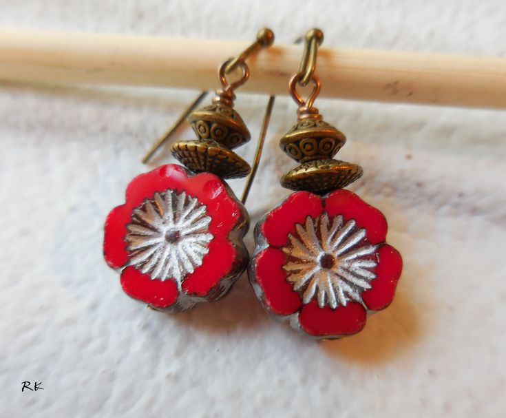 Red Flower Earrings, Red Dangle Earrings, Czech glass, Drop earrings, Red flowers, Rustic vintage brass, Boho chic, Bohemian,Romantic, gift for women, gift for mother Red Czech glass flower beads, are decorated with brass bronze spacer beads .. The length is 36mm (1.40 inches), including the antiqued brass earring wires. Earring wires can be changed. Please contact me if you want me to change the wires More flower jewelry: https://www.etsy.com/shop/wildstone?search_query=flowers Earrings: https: Retro Flower Earrings For Gift, Retro Flower-shaped Earrings For Gift, Retro Flower Shaped Earrings For Gift, Retro Flower Shaped Earrings As Gift, Retro Flower Shape Earrings For Gift, Unique Red Flower Earrings, Red Bohemian Soldered Earrings, Vintage Red Brass Earrings, Bohemian Red Soldered Earrings