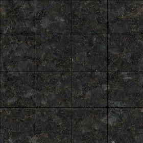 an image of black marble textured tile with different colors and sizes on the surface