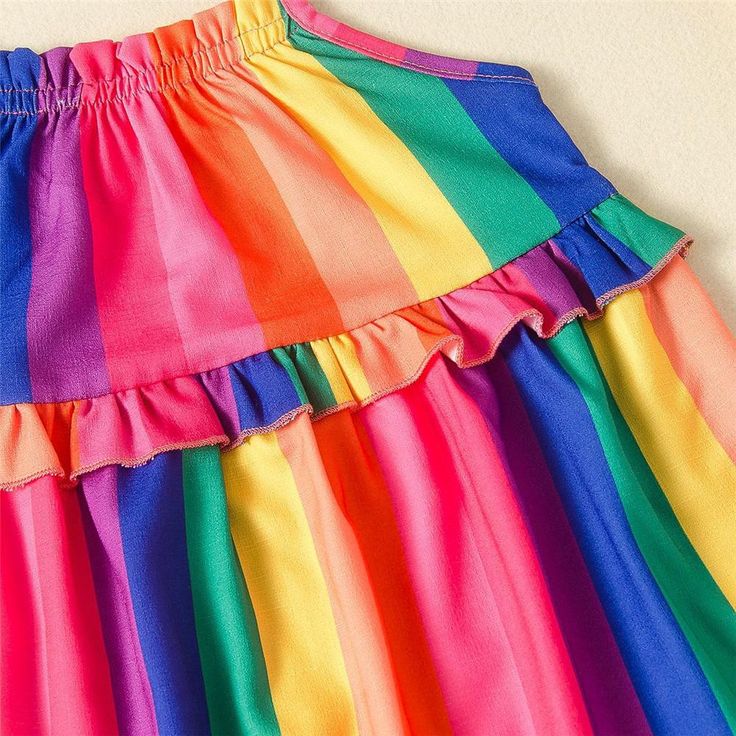 Product Title: Girls Rainbow Striped Printed Sleeveless Dress Kids Wear Keyword Tag: Best Website For Baby Clothes* Soft Feeling & Cozy Comfortable* Package Package Included: 1 Dress* Fabric & Fabric: 95% Polyester, 5% Spandex* Available for Machine Wash as well as TumbleDry* Imported Are you look for a best quality and cheapest dress? Then Girls Rainbow Striped Printed Sleeveless Dress Kids Wear Wholesale is the best one for you! The New style with amazing designs for reflect fashion vibes that