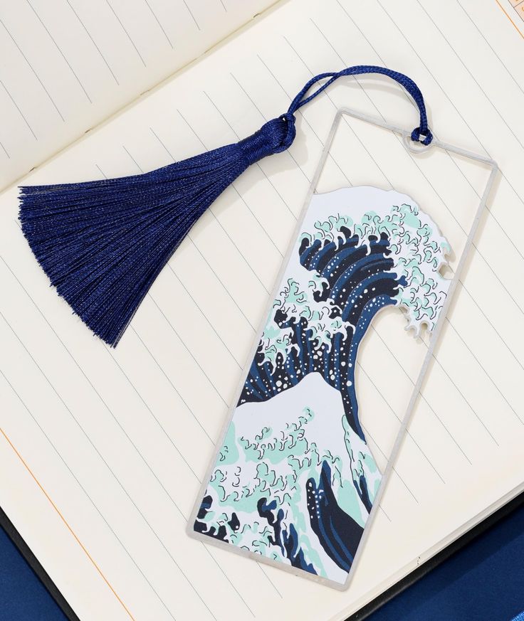 a bookmark with an image of the great wave on it