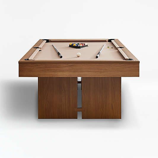 a pool table with two cues and a ball on the top, in front of a white background