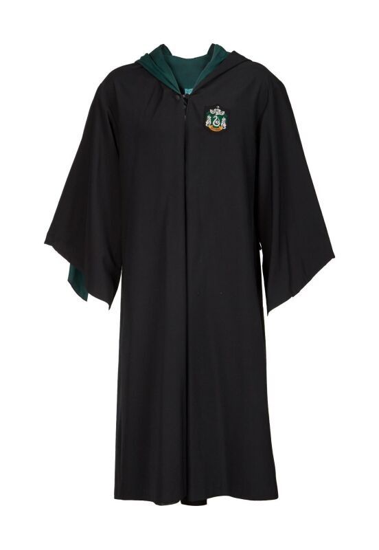 a black graduation gown with green trims and a crest on the chest, in front of a white background