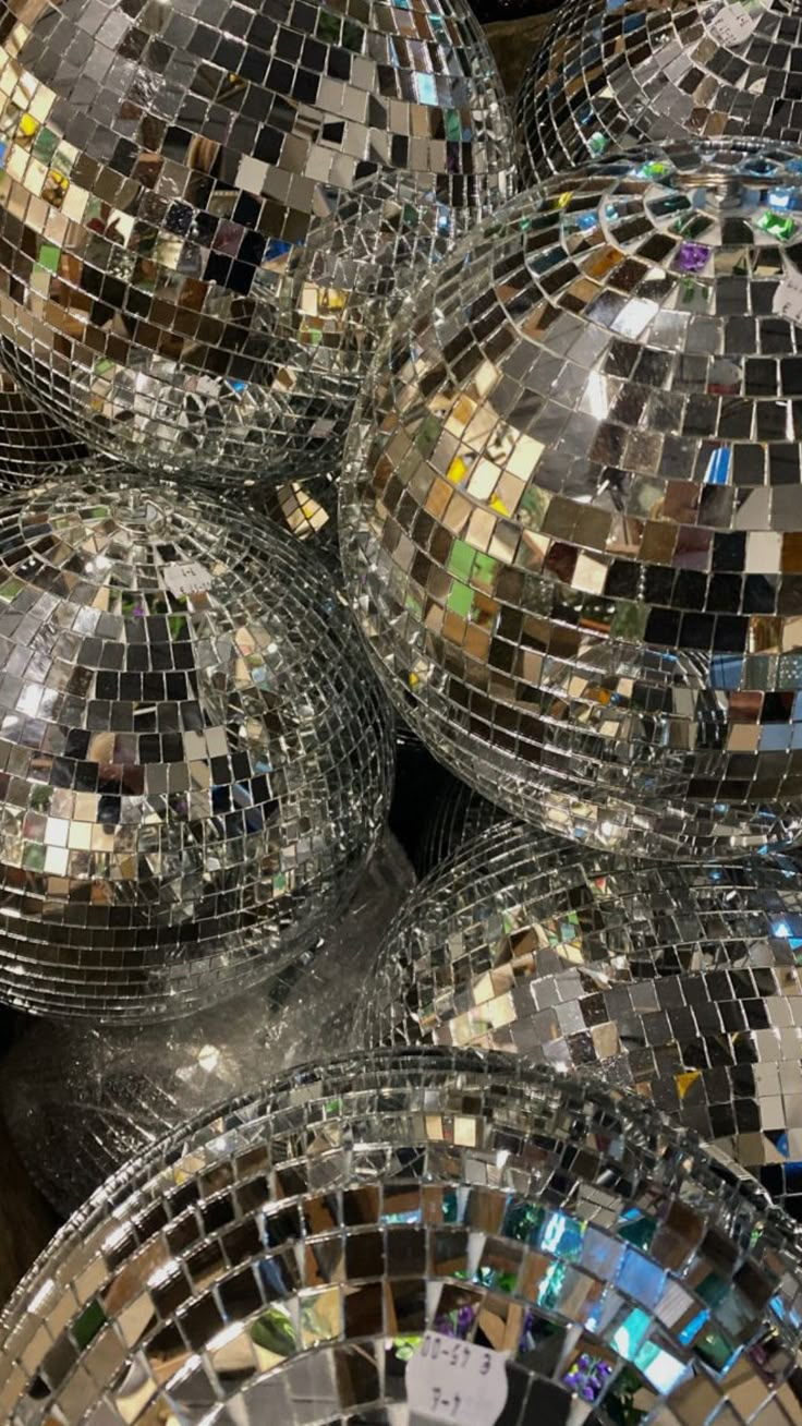 several disco balls are stacked on top of each other