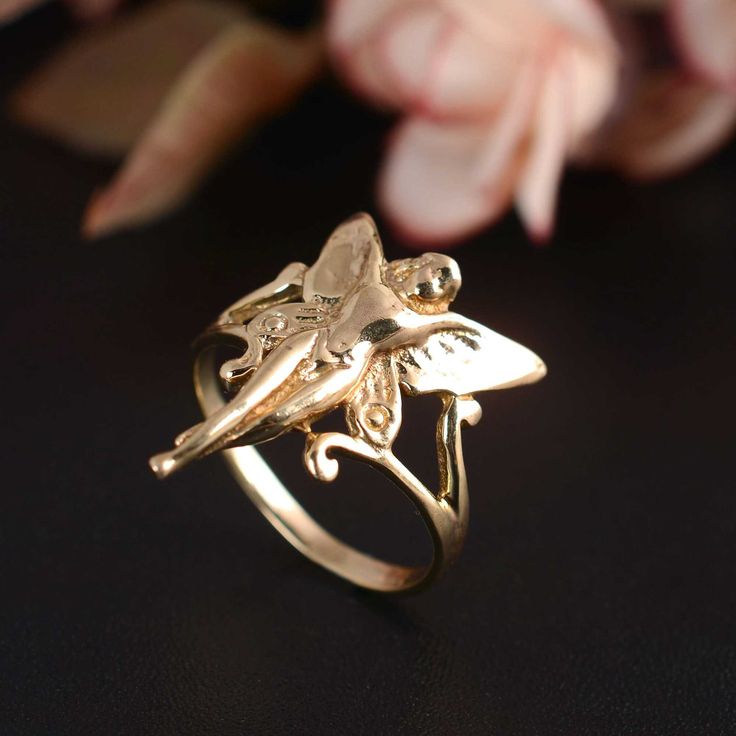 14K gold plated Brass Angle Fairy Ring, Faerie Ring,  Angel Ring, Brass Fairy Ring,  Adjustable Brass Ring, Rings For Woman, Brass Rings Handmade Ring We provide the Excellent quality Jewelry to our Customers. Customer satisfaction is our first priority. All sizes are available for any query contact us. PRODUCT    :-  Band Ring Material        :-  Brass  Or  925 sterling silver We have Brass rings in all size for both men and women. We always use precious and semi precious gemstone for making jewelry.If you have any design in your mind so please let us know we will try our best to made it( For customization Making charges will apply). we give fast delivery service . If you have any questions or problem please contact us :- ♥Thank you for Visiting my shop!    SinghHandmadeDesigns Faerie Ring, Fairy Design, Angel Ring, Fairy Ring, Brass Rings, Angel Pendant, Cute Fairy, Special Ring, Brass Ring