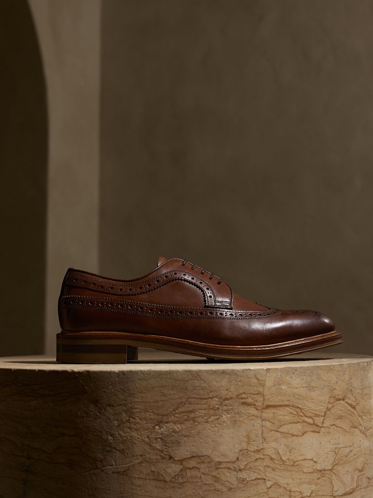 Our traditional long-wing blucher cut from supple Italian calf-skin leather.  This pair is outfitted with an antique storm welt, mounted on a rubber sole.  Details include intricate broguing, a medallion toe, and an iconic silhouette that have remain Timeless Brogue Oxfords For Derby, Timeless Wingtip Dress Shoes For Derby, Timeless Derby Shoes With Brogue Detailing For Work, Timeless Brogue Oxfords With Plain Toe, Timeless Derby With Brogue Detailing For Business Casual, Timeless Derby Shoes With Brogue Detailing For Business Casual, Timeless Brogue Derby Shoes For Business Casual, Timeless Business Casual Derby With Brogue Detailing, Timeless Dress Shoes With Brogue Detailing