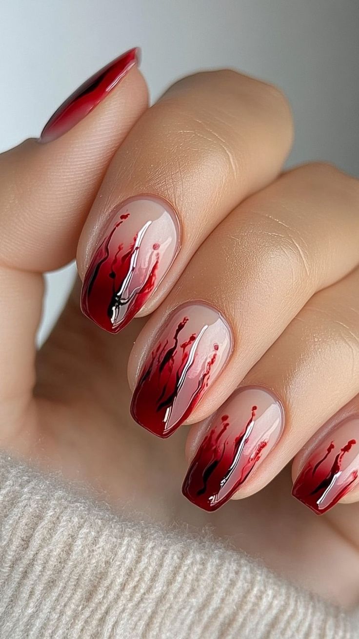 This Halloween nail design is inspired by E.T. and werewolf movies. “Sometimes, simple designs can create a spooky vibe,” Orton says. “This look features a blac
See More... Nail Ideas Short Design, Easy Nails Halloween, Short Blood Splatter Nails, Halloween Nail Easy, Nails Blood Design, Blood Splatter Nails Short, Halloween Nails Squoval, Short Blood Nails, Black And Red Nails Ideas Goth