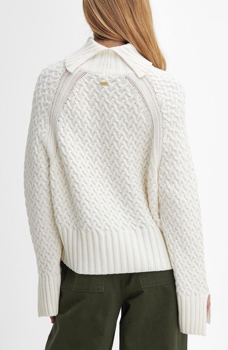 Add rich texture to your look with this basketweave sweater knit in a slouchy fit from wool-rich yarns and finished with a chunky turtleneck that's split at the back. Turtleneck Long sleeves with ribbed cuffs 40% wool, 25% viscose, 25% polyamide, 10% cashmere Hand wash, dry flat Made in Turkey Chic Wool Sweater With Pointelle Knit, Chic Textured Knit Sweater With Funnel Neck, Chic Textured Knit Funnel Neck Sweater, Chic Funnel Neck Textured Sweater, Funnel Neck Merino Wool Sweater With Textured Knit, Merino Wool Sweater With Textured Knit And Funnel Neck, Textured Merino Wool Funnel Neck Sweater, Basket Texture, Chunky Turtleneck