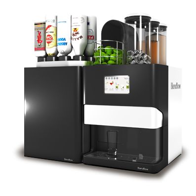 an automatic coffee machine with various drinks and condiments on the top shelf, in front of a white background