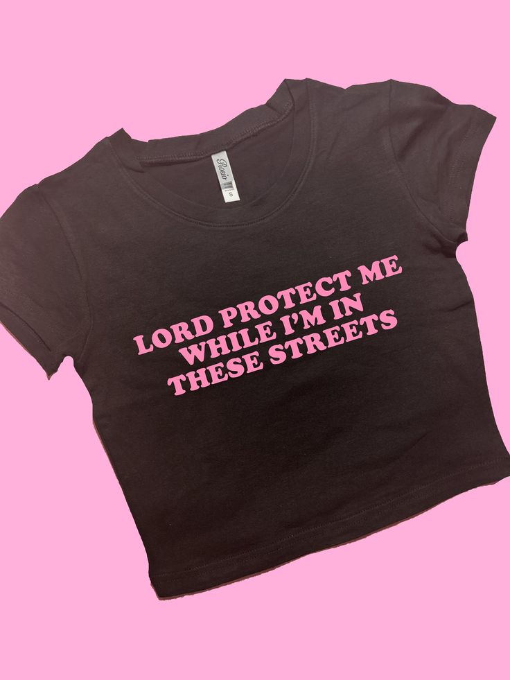 In These Streets SNUG FIT Crop Top | Cute Crop Top | Graphic Top | Gift For Her | Y2K  Tee | Y2K crop top | Gift for friend | Baby Tee Comfy Top to Lounge in! Actual item may be lighter/darker than pictured. M A T E R I A L S - SNUG FIT - 100% RING SPUN COTTON - Shoulder Taping S I Z I N G - Size chart is available on our listing photos. S H I P P I N G  &  P R O D U C T I O N  T I M E - Production Time is 5 Business Days. (May be delayed during the Holiday Season) - Shipping Time is 2-6 Busines Graphic Crop Tops, Diy Crop Top, Silly Clothes, Silly Shirt, Funky Shirts, Y2k Crop Top, Graphic Crop Top, Cute Crop Top, Shirt Y2k