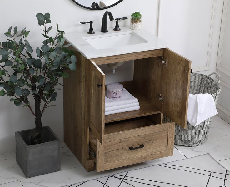 a bathroom with a sink and wooden cabinet