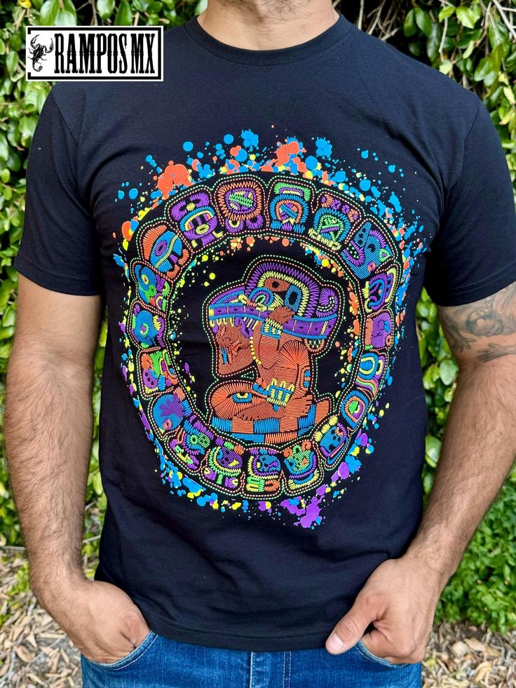 Handmade Serigraphy Print, Mexican Mens Aztec Warrior Piramids T-Shirts Graphic Tees that are super stylish , bright and glow in Blacklight , Neon Lights, Mexican Art Skull Luchador shirts , made by Artisans in Mexico in several designs . Mexican men Shirts. Short sleeve Men's apparel made of ultrasoft 100% cotton, this comfortable style is designed with a classic crew neckline, short sleeves and relaxed Fit, Our t-shirt is a perfect gift for that special person near you. Playera Mexicana de Luchador Santo Artesanal.  Please check the Product images for Size measurements guide Follow us in Instagram and Facebook: @RamposMX Short Sleeve T-shirt With Sublimation Print For Festival, Black Graphic Tee For Festivals, Black Graphic Tee For Festival, Multicolor Short Sleeve T-shirt For Festivals, Glow In The Dark Graphic Tee With Short Sleeve, Glow In The Dark Short Sleeve Graphic Tee, Black Screen Print T-shirt For Festival, Rave Festival Graphic Print T-shirt, Rave Festival T-shirt With Graphic Print