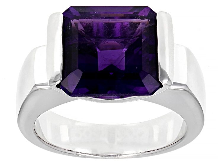 6.39ct square octagonal African amethyst solitaire rhodium over sterling silver Men's ring. Measures approximately 0.58"L x 0.47"W. Finished under gallery. Not sizeable. Classic Amethyst Ring With Rectangular Stone For Formal Occasions, Modern Rectangular Jewelry With Center Stone, Modern Sterling Silver Amethyst Ring For Formal Occasions, Square Cut Amethyst Ring For Formal Occasions, Formal Square Cut Amethyst Ring, Modern Emerald Cut Amethyst Ring, Octagon Silver Amethyst Ring For Formal Occasions, Blue Tungsten Ring, Sterling Silver Mens Rings