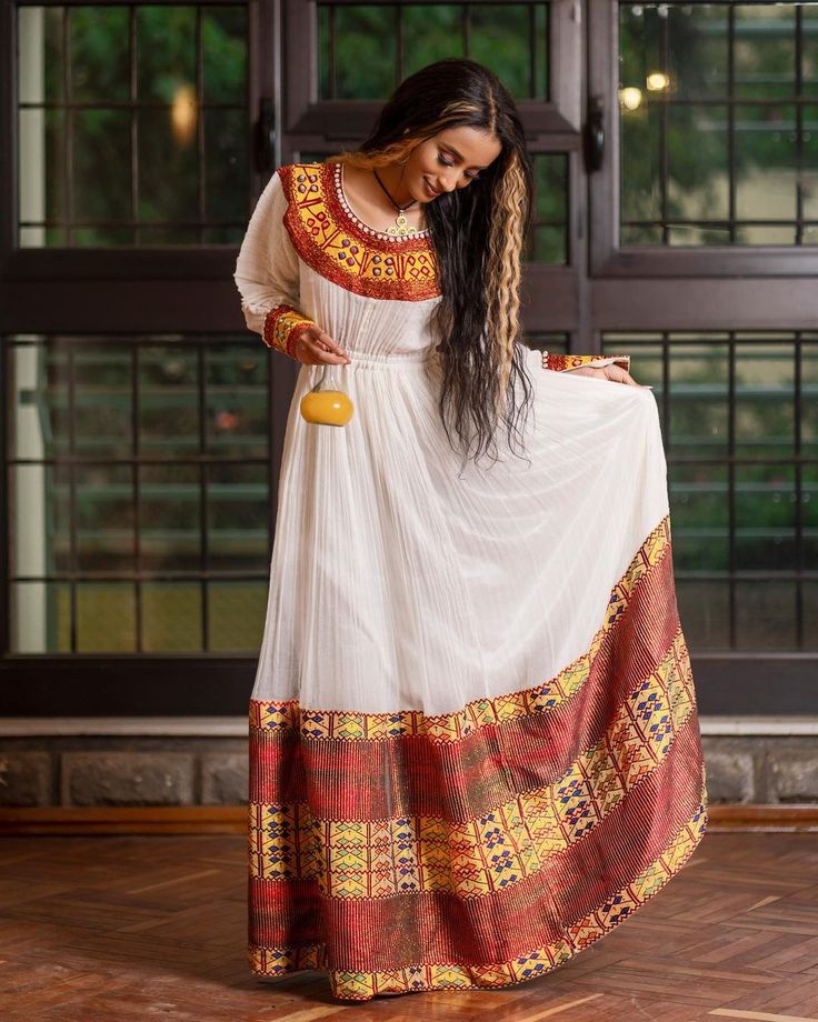 Red and Gold Habesha Dress Festive Anarkali Dress With Woven Motifs, Bohemian Dress For Diwali Traditional Ceremonies, Bollywood Style Maxi Dress For Traditional Ceremonies, Traditional Embroidered Cutdana Wedding Dress, Traditional Wedding Embroidered Dress With Cutdana, Traditional Embroidered Wedding Dress With Cutdana, Traditional Festive Dress With Woven Motifs, Anarkali Dress With Woven Motifs For Traditional Ceremonies, Traditional Embroidered Maxi Dress For Diwali