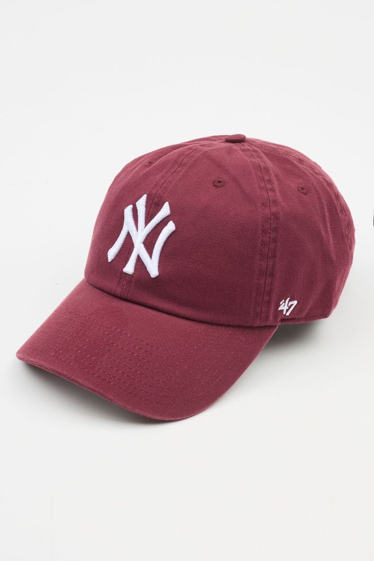 No bad hair days here! Finish off your OOTD with the 47 Brand Clean up Cap now available at Garage! Sport the iconic NY logo with all your most 'gram-worthy looks. - Garment Washed Cotton - Unstructured, relaxed fit - Curved bill - Embroidered front logo - Adjustable pull-through back fabric strap - Imported Cute Hats Women, Cool Hats Women, Burgundy Baseball Hat Outfit, Trending Hats For Women, Ball Cap Aesthetic, Burgundy Hat Outfit, 0 Aesthetic, Aesthetic Hats, Cute Baseball Hats