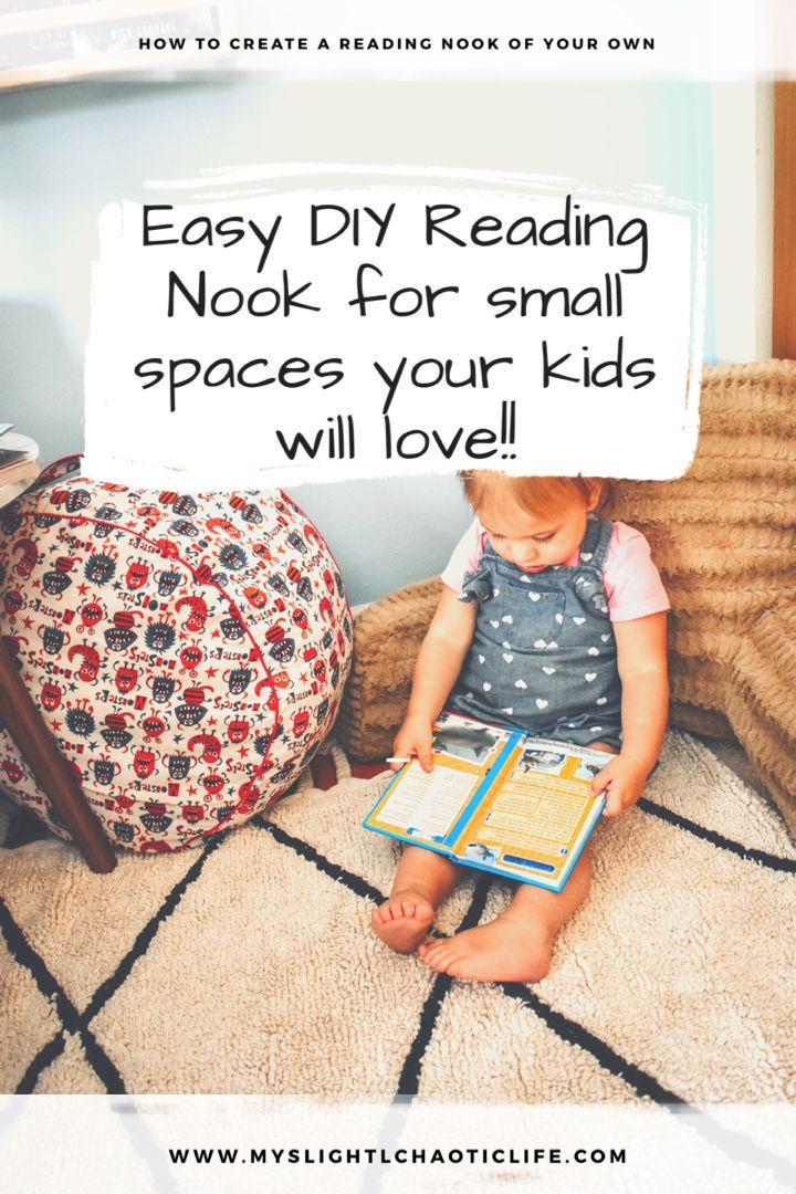 a young child sitting on the floor reading a book with text overlay that reads diy kids'reading nook for small spaces