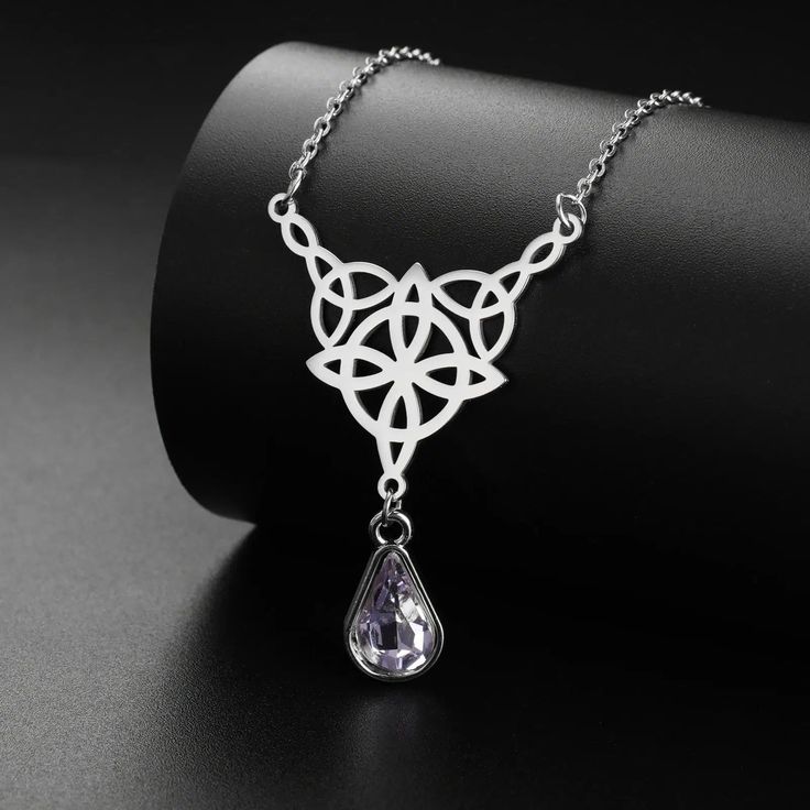 ⚜️Looking for a stunning piece of jewelry that exudes both style and spirituality? Look no further than our Celtics Knot Necklace! Crafted with Stainless Steel and adorned with a mesmerizing Crystal Rhinestone, this necklace will add a touch of magic to any outfit. Complete with an elegant pendant size of 32.5*27.9mm, it's the perfect accessory for any witch or crystal lover. Add it to your collection today and let its powerful energy guide you on your journey! ✨🔮 Witch Knot, Crystal Witch, Trendy Necklace, Witch Jewelry, Powerful Energy, Crystal Pendant Necklace, Elegant Pendant, Necklace Crystal, Trendy Necklaces