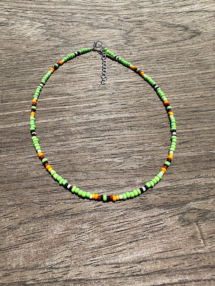 Neon Western Beaded necklaces made from glass seed beads and 18 inches with extender. Custom, affordable western jewelry with extenders.   ( Disclaimer: All items are uniquely crafted and created by GenZCreations. Our Items are NOT AUTHENTIC American Indian or Alaska Native American nor do they represent any Indian Tri Green Hand-strung Beaded Necklaces For Festival, Hand-strung Green Beaded Necklaces For Festivals, Green Hand-strung Beaded Necklace For Festival, Hand-strung Green Beaded Necklace For Festival, Green Southwestern Beaded Necklaces For Festival, Southwestern Green Beaded Necklaces For Festivals, Southwestern Green Beaded Necklaces With Round Beads, Southwestern Green Beaded Necklaces, Green Tiny Heishi Beads Necklaces