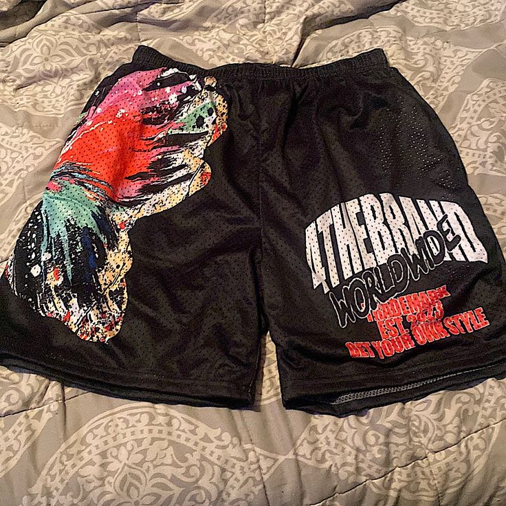 This Is A Dope Pair Of Graphic Mesh Shorts Comfy But Ran Small Tag Says Xl But Fit Like A Large Never Worn But Took Tags Off Black Sports Pants For Summer, Black Bottoms With Letter Print, Short Length, Black Bottoms With Letter Print In Short Length, Black Bottoms With Letter Print, Black Bottoms With Letter Print Short Length, Black Short Length Bottoms With Letter Print, Black Graphic Print Bottoms For Spring, Black Short Bottoms With Letter Print, Black Letter Print Pants For Summer