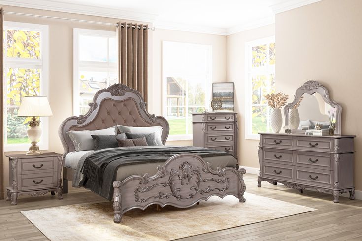 a bedroom scene with focus on the bed, dressers and mirror in the room