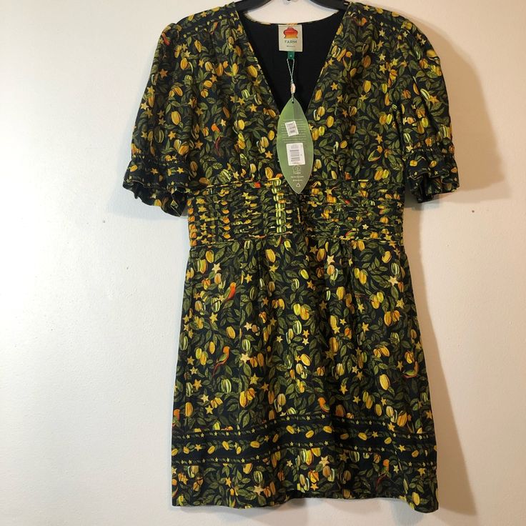 Farm Rio Star Fruit Mini Dress M New With Tag V Neck With Hook Closure Short Puff Sleeves Linen Blend Trending Pop Of Neon Green Beautiful Detail In Waist With Gold And Black Buttons Approximate Measurements Pit To Pit 18” Waist 15” Length 33” Great Casual Summer Style Tropical Print If You Like It, Feel Free To Make A Reasonable Offer. Yellow Short Sleeve Mini Dress For Fall, Yellow Short Sleeve Vintage Mini Dress, Fitted Short Sleeve Dress With Lemon Print, Wrap Tie Dress, Star Fruit, Crochet Mini Dress, Short Sleeve Mini Dress, Satin Mini Dress, Summer Style Casual