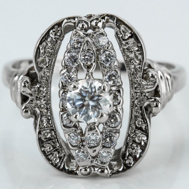 Vintage 14k White Gold Half Carat Diamond Cocktail Ring This Ring Is Made Of 14 Karat White Gold & Contains A Beautiful Assortment Of 17 Diamonds, Totaling .50 Carat, And A Unique Antique Design. A Large Round Diamond Is Set In The Center, Paired With Surrounding Diamonds, Making For A Lavish Piece. This Ring Is Resizable By Any Qualified Jeweler. Size: 7.25 (Resizable) Metal: 14 Karat White Gold Weight: 4.30 Dwt / 6.69 Grams Diamonds: 17-Round = .50ctw (Center = .35ct) The Photograph Is Of The Actual Item You Will Receive. 17245-1*E Payment Receipt, Diamond Cocktail Ring, Diamond Cocktail Rings, Unique Antiques, Antique Design, Cocktail Ring, Womens Jewelry Rings, Cocktail Rings, Round Diamond