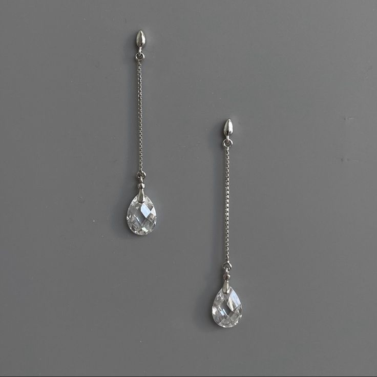 New Post Style 925 Sterling Silver Rock Crystal, Clear, Faceted Length - 1 7/8” Width - 1/4” Sterling Silver Drop Linear Earrings For Party, Sterling Silver Long Drop Teardrop Earrings For Party, Minimalist Sterling Silver Teardrop Earrings For Formal Occasions, Elegant Sterling Silver Linear Earrings With Diamond Cut, Sterling Silver Teardrop Linear Earrings For Party, Elegant Sterling Silver Nickel-free Teardrop Earrings, Silver Sterling Silver Drop Linear Earrings, Silver Sterling Drop Linear Earrings, Sterling Silver Linear Earrings