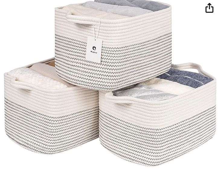 three storage baskets stacked on top of each other