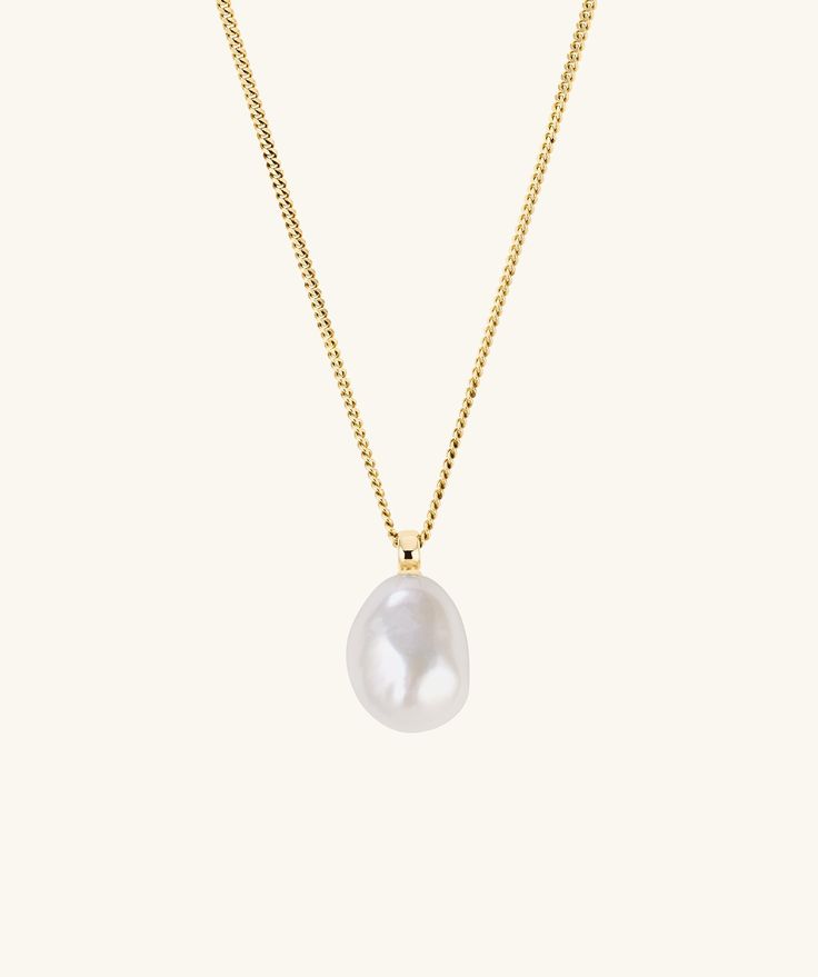 An even bolder spin on a well-loved classic, this pearl pendant was made to be stacked and seen. Handcrafted in 18k gold vermeil and a freshwater pearl. Yellow Gold Pendant Jewelry With Pearl Drop, Yellow Gold Pearl Drop Pendant Jewelry, Gold Plated Teardrop Pearl Pendant Necklace, Yellow Gold Baroque Pearl Pendant Necklace, Classic Baroque Pearl Necklace With Pearl Charm, Classic Baroque Pearl Pendant Necklace, Gold Plated Oval Pearl Pendant Jewelry, Yellow Gold-plated Necklace With Pearl Pendant, Yellow Gold Necklaces With Baroque Pearl Pendant