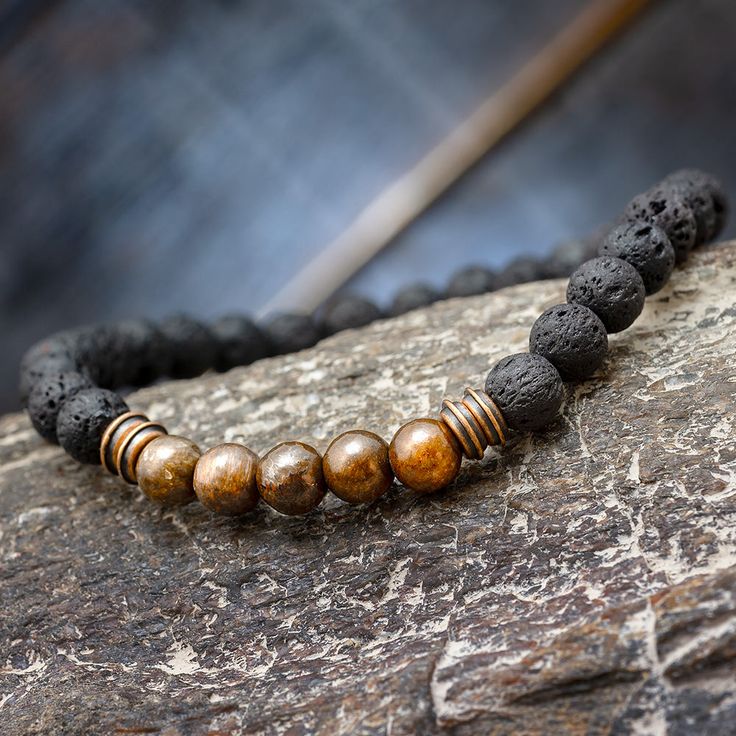 Dinosaur Bone Bracelet Hand-strung Lava Stone Bracelets, Handmade Bohemian Lava Stone Jewelry, Bohemian Lava Stone Jewelry Gift, Round Beads Bracelet With Natural Lava Stone, Adjustable Hand-strung Lava Stone Bracelet, Healing Lava Stone Beaded Bracelets, Spiritual Lava Stone Bracelets With 8mm Beads, Bohemian Jewelry With Natural Lava Stones, Spiritual Lava Stone Beaded Bracelets With 8mm Beads