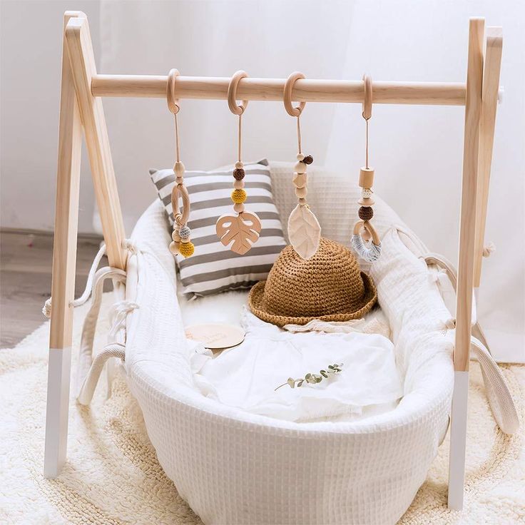 a white bed with some accessories hanging from it