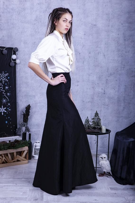 - Long taffeta skirt- High waist silhouette design- Silk top with a bow tie- 25+ colors of silk Model wears size US 8, she is 180 cm tallPlease, use this size chart to select your sizeUS 0 >>> Bust 82 cm (32.5 inches) Waist 64 cm (25 inches) Hips 89 cm (35 inches)US 2 >>> Bust 85 cm (33.5 inches) Waist 66 cm (26 inches) Hips 92 cm (36 inches)US 4 >>> Bust 88 cm (34.5 inches) Waist 68 cm (27 inches) Hips 94 cm (37 inches) US 6 >>> Bust 90 cm (35.5 inches) Waist Feminine Satin Skirt For Formal Occasions, Feminine Formal Satin Skirt, Formal Feminine Satin Skirt, Elegant Dress With Voluminous Skirt For Night Out, Elegant Fitted Maxi Skirt For Formal Occasions, Formal Flared Dress With Ruffles, Elegant Formal Fitted Maxi Skirt, Chic Silk Skirt For Wedding, Elegant Formal Maxi Skirt