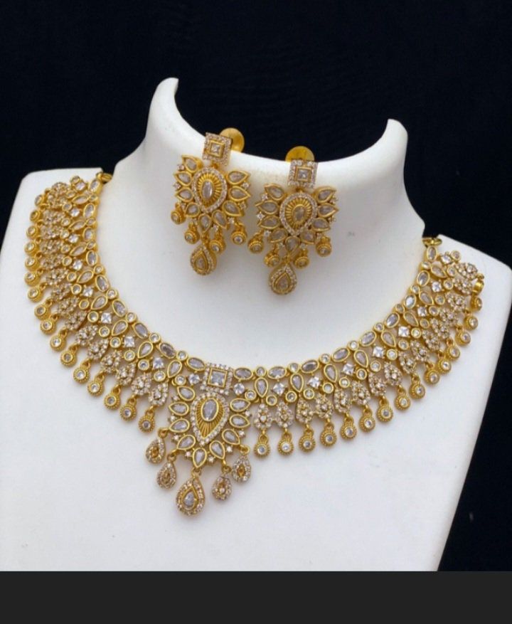 New Round American Diamond Temple Jewelry Necklace, Diamond Kundan Necklace With Stone Work For Reception, Hand Set American Diamond Chandbali Necklaces, Gold Chandbali Diamond Necklaces, Gold Diamond Chandbali Necklaces, Gold Necklace With Stone Work In American Diamond, Kundan Necklace With American Diamond Stone Work, Heavy Gold Diamond Jewelry, American Diamond Chandbali Jewelry For Anniversary