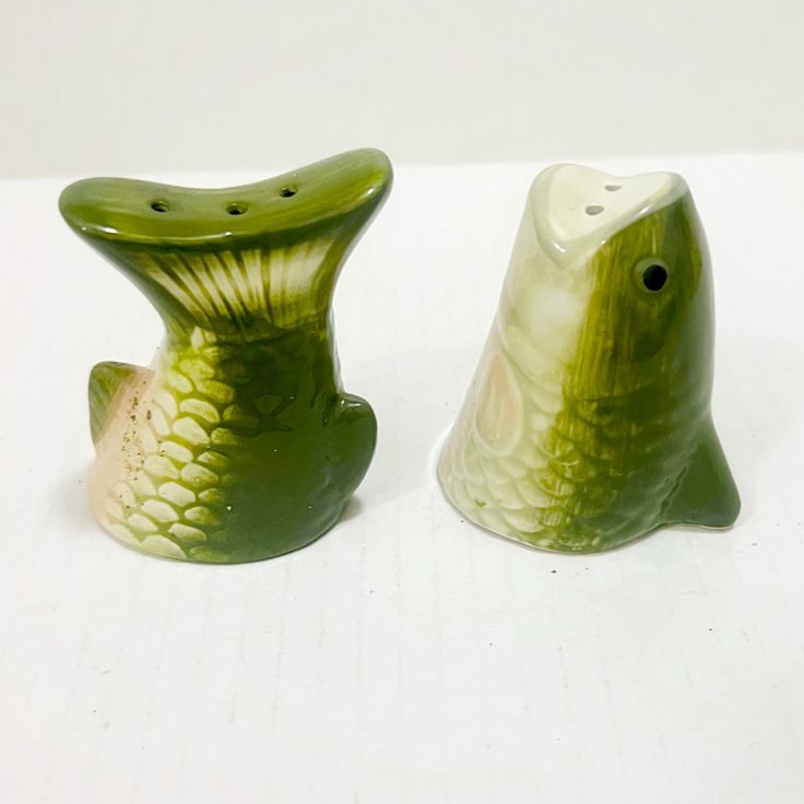 two ceramic fish shaped salt and pepper shakers