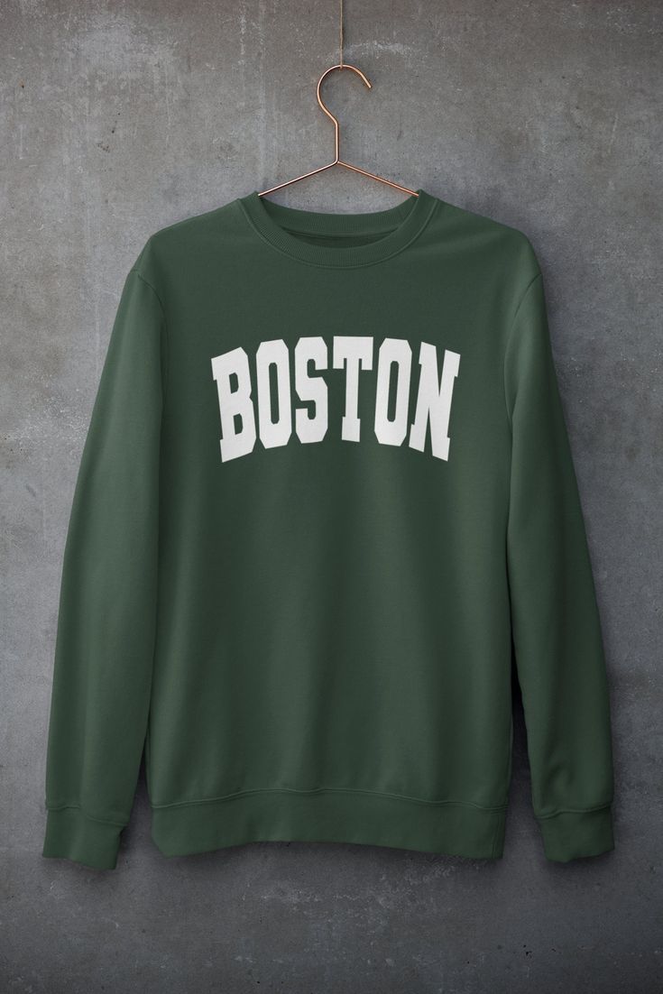 Are you a lover of Boston? Looking for the perfect way to show your pride for Beantown? This Unisex college-style crew neck sweatshirt, celebrating Boston, is sure to resonate with locals, expats, and fans of the city. The perfect gift for family and friends who embrace Boston's unique charm, whether it's the Freedom Trail, Fenway Park, or the vibrant neighborhoods that make Boston one of a kind! - All sizes are Unisex - Printed in USA - 50% cotton, 50% polyester - Pre-shrunk - 1x1 athletic rib- School Spirit Sweatshirt With Lettering For Streetwear, University Logo Sweatshirt For Campus, University Logo Sweatshirt For College, Collegiate Crew Sweatshirt With Letter Print, Collegiate Sweatshirt With University Logo For Fall, Casual University Logo Sweatshirt For Fall, Cotton Fan Apparel Sweatshirt For Campus, Cotton Sweatshirt For Campus Fan Apparel, Collegiate Campus Sweatshirt With Text Print