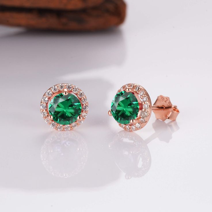 These gorgeous, timeless earrings features our favorite emerald design and hand picked crystals.   ✦ DETAILS ✦ ✧ Handcrafted  ✧ emerald and cz crystals  ✧ 8.0mm Round (About 6/8 inches) ✧ Sterling Silver 925 or Rose Gold over Sterling Silver or Gold on Sterling Silver.   ✧ This ring will arrive ready to gift in a Kherish Jewelry Pouch. ✧ PRE-ORDER: Items that are preorder only will ship within 10-15 business days.  You will receive an email with the updated processing time if you order a size/op Classic Rose Gold Emerald Jewelry, Emerald Jewelry With Halo Design For Gift, Emerald Jewelry With Halo Design As A Gift, Gift Emerald Jewelry With Halo Design, May Birthstone Halo Design Earrings Gift, May Birthstone Halo Earrings As Gift, May Birthstone Halo Earrings, Rose Gold Emerald Jewelry For May Birthstone, Green Round Cut Earrings As Gift