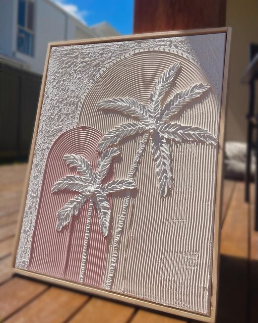 an image of a palm tree etched in glass