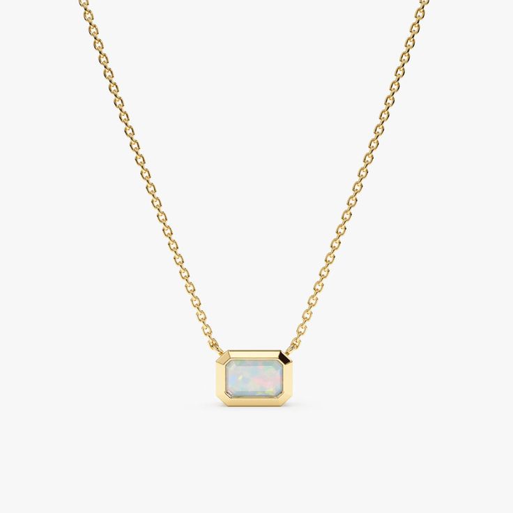 Gold Jewelry With Rectangular Polished Stone, Gold Jewelry With Polished Finish And Rectangular Stone, Yellow Gold Necklace With Emerald Cut Bezel Setting, Yellow Gold Emerald Cut Necklace With Bezel Setting, Yellow Gold Emerald-cut Necklace With Bezel Setting, Elegant Jewelry With Bezel Setting Rectangular Pendant, Gold Rectangular Emerald Necklace For Formal Occasions, Classic Gold Emerald Cut Emerald Necklace, Classic Gold Emerald Cut Necklace