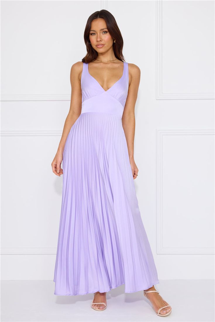 Length from shoulder to hem of size S: 115cm. Chest: 38cm, Waist: 31cm, across front only of size S. Maxi dress. Lined. Model is a standard XS and is wearing size XS. True to size. Non-stretch. Satin. Flowy skirt. Pleated design. Open back with elastic details. V-neck. Zipper. Cold hand wash only. Polyester. The perfect dress for summertime events. The Dazzling Opulence Maxi Dress features a flowy, pleated skirt, a V-neck and an open back with elastic details. Style it with heels and curls for a look we love. Purple Maxi Evening Dress For Summer, Pleated V-neck Dress With Fitted Bodice, Purple Lined Midi Length Dresses, Midi Length Evening Dress With Pleated Back, Purple Fitted Maxi Dress For Casual Occasions, Fitted Purple Maxi Dress For Casual Occasions, Purple A-line Summer Evening Dress, Purple A-line Evening Dress For Summer, Spring A-line Evening Dress For Date Night