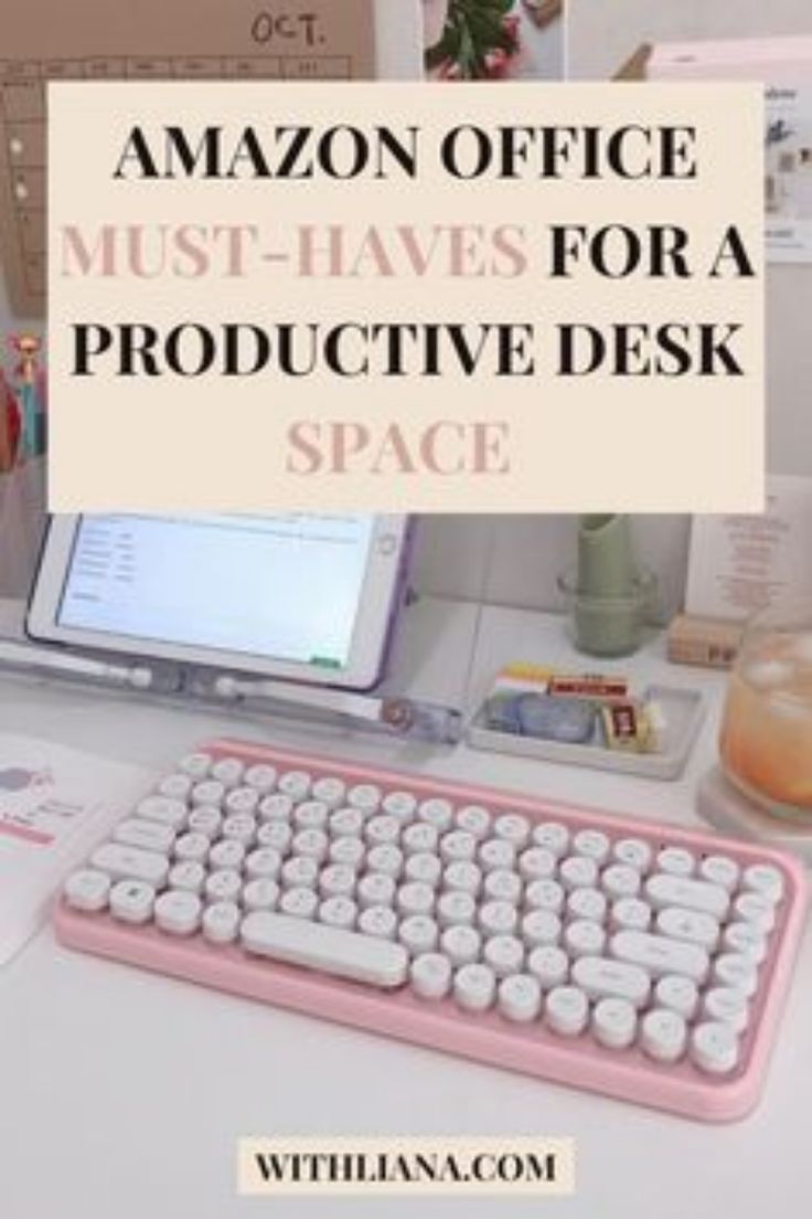 a pink keyboard sitting on top of a white desk